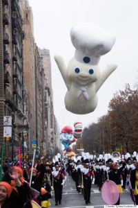 The Pillsbury Doughboy balloon floats in the Macy's Thanksgiving Day Parade on Thursday, Nov. 27, 2014 in New York. (Photo by Charles Sykes/Invision/AP)